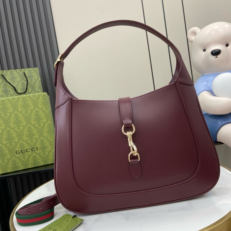 G*u*i top handle bags